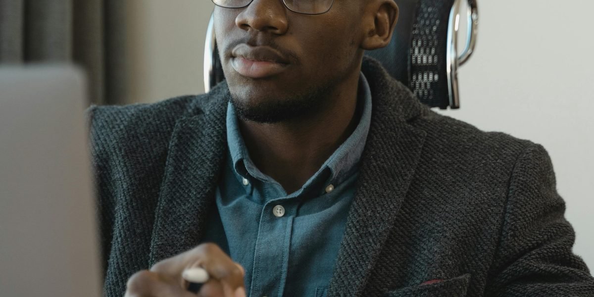 A person overcoming distractions by maintaining focus on their tasks in a structured workspace.