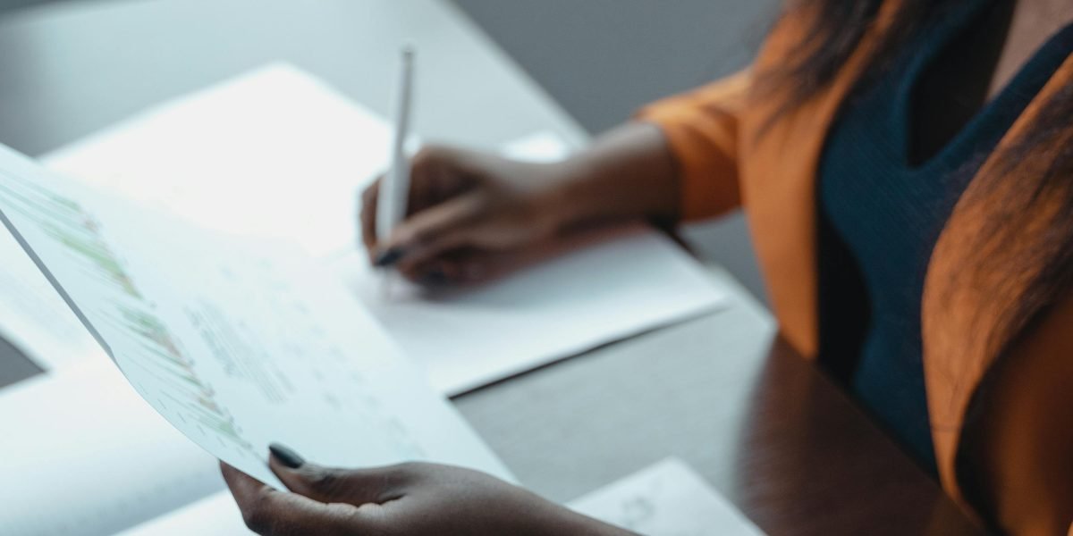 An individual outlining personal and career objectives, aligning them with learning paths.