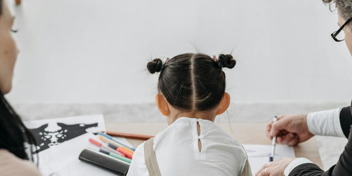 An adult learner balancing family responsibilities with online studies, emphasizing the flexibility of associate degrees.