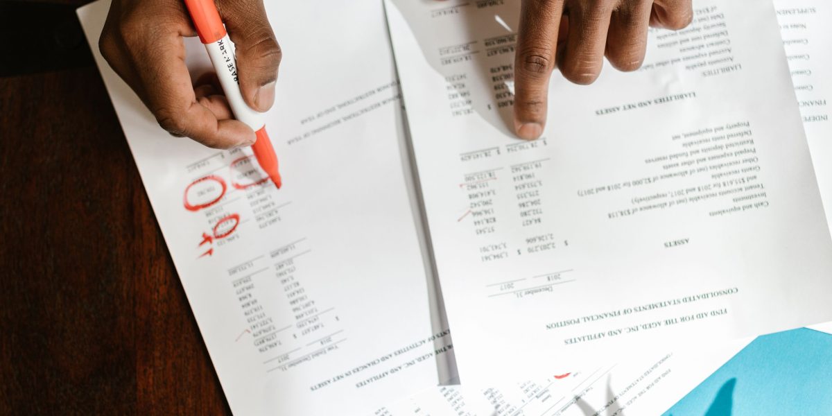 A person evaluating different certification options and career paths at a desk.